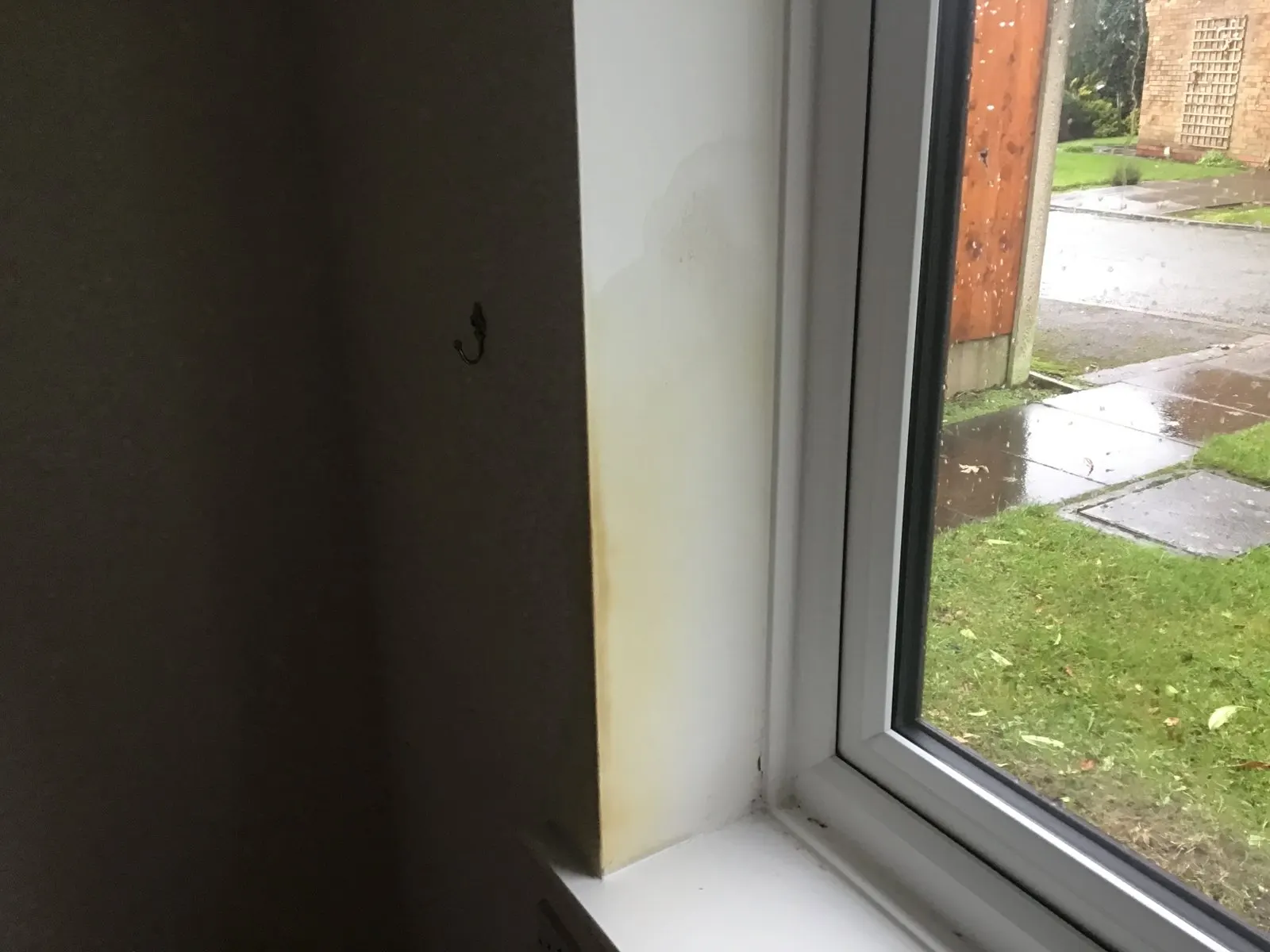 Damp staining around an internal window opening