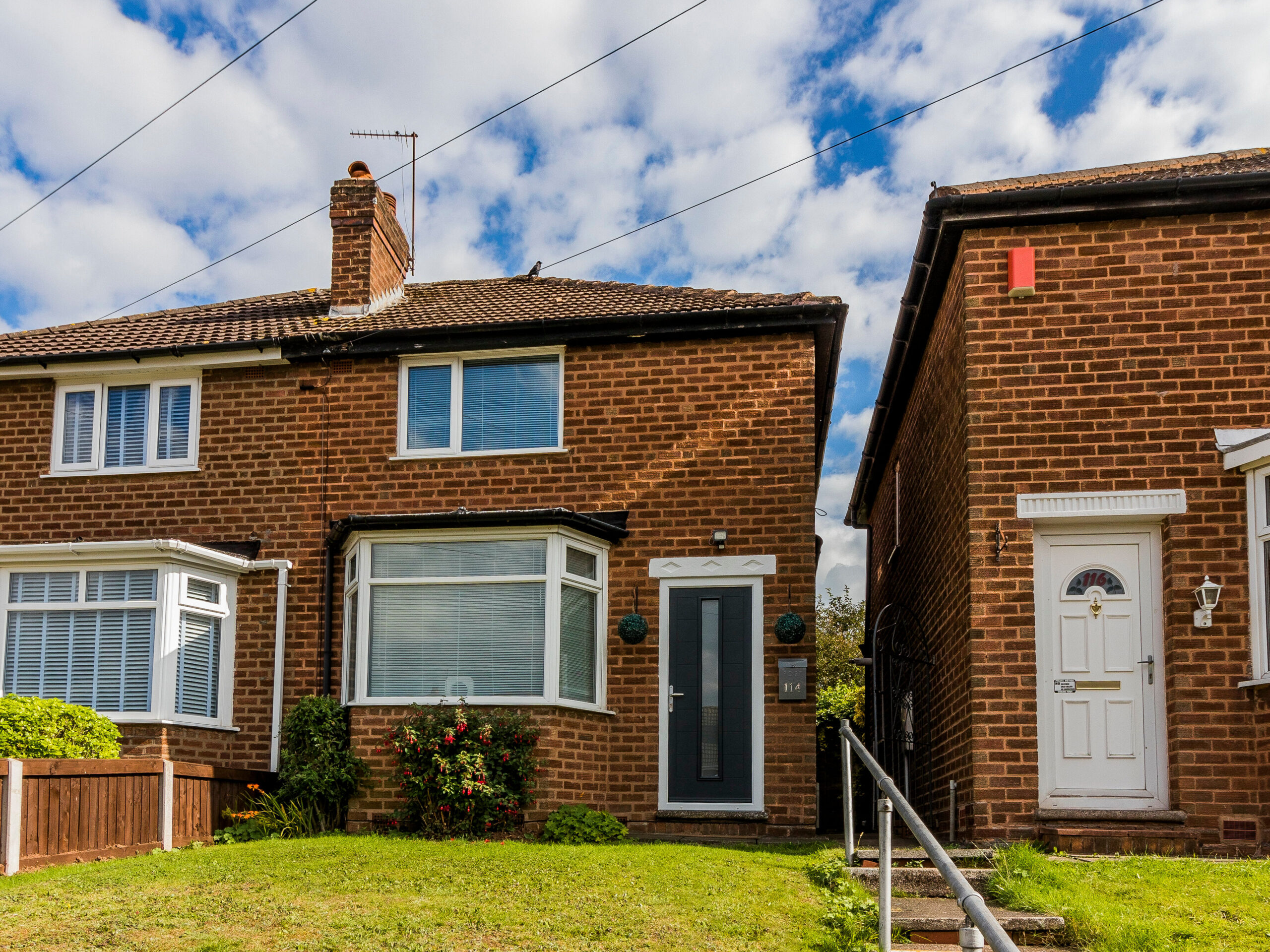 Photo of a semi detached terraced house built of brick