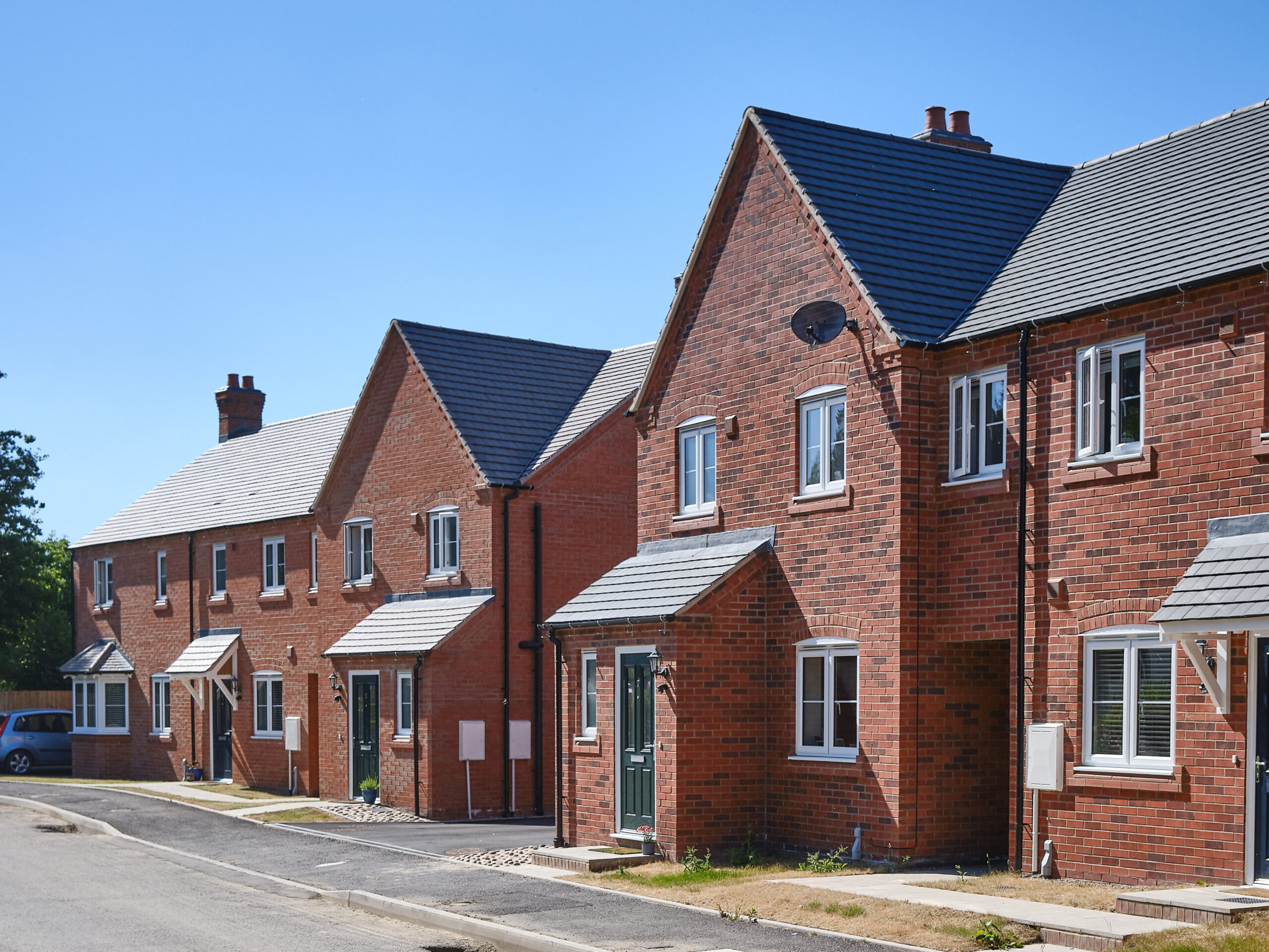 Photo of a new build brick house